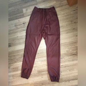 Maroon faux leather pants